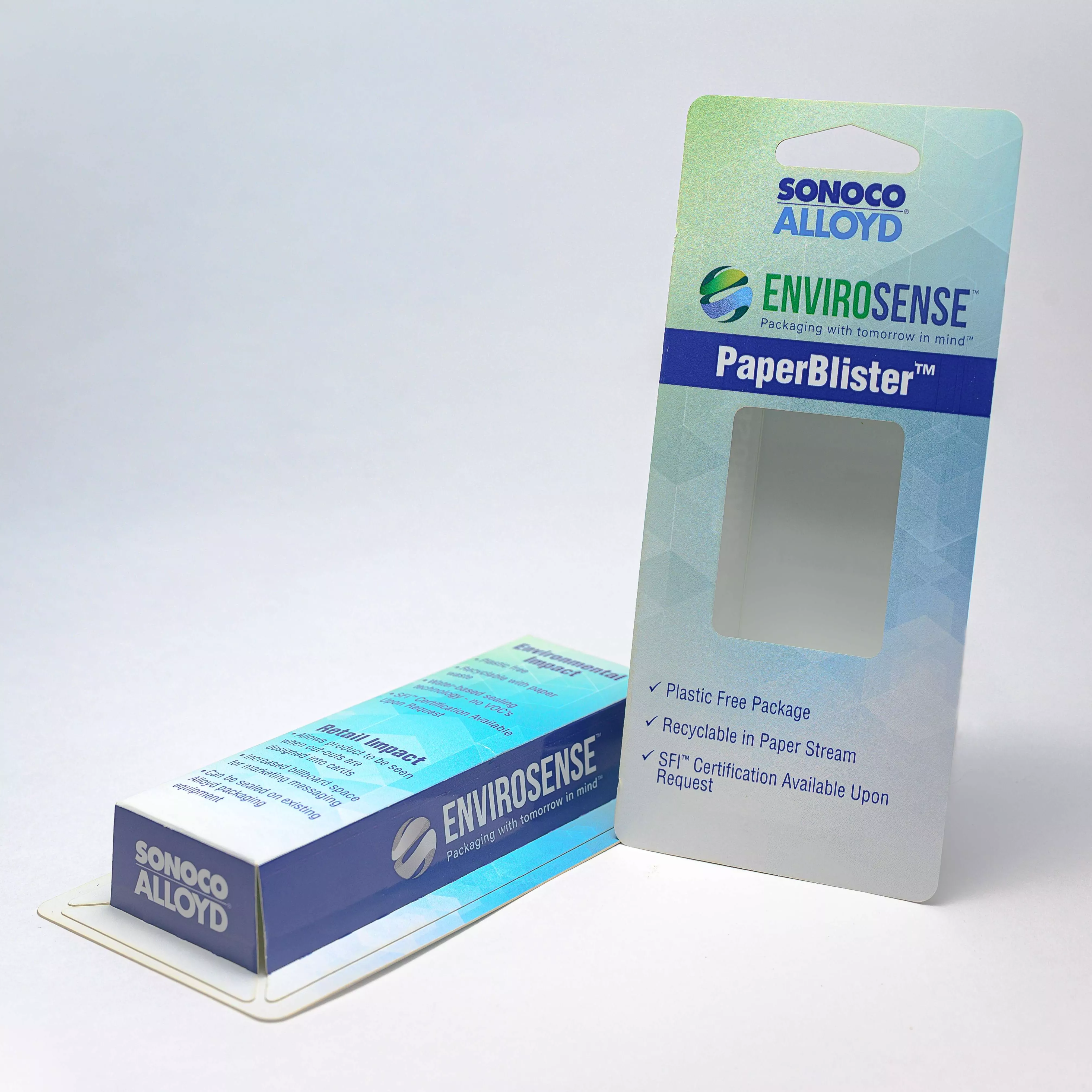 Two all-paper PaperBlister packages one lying flat and one standing up
