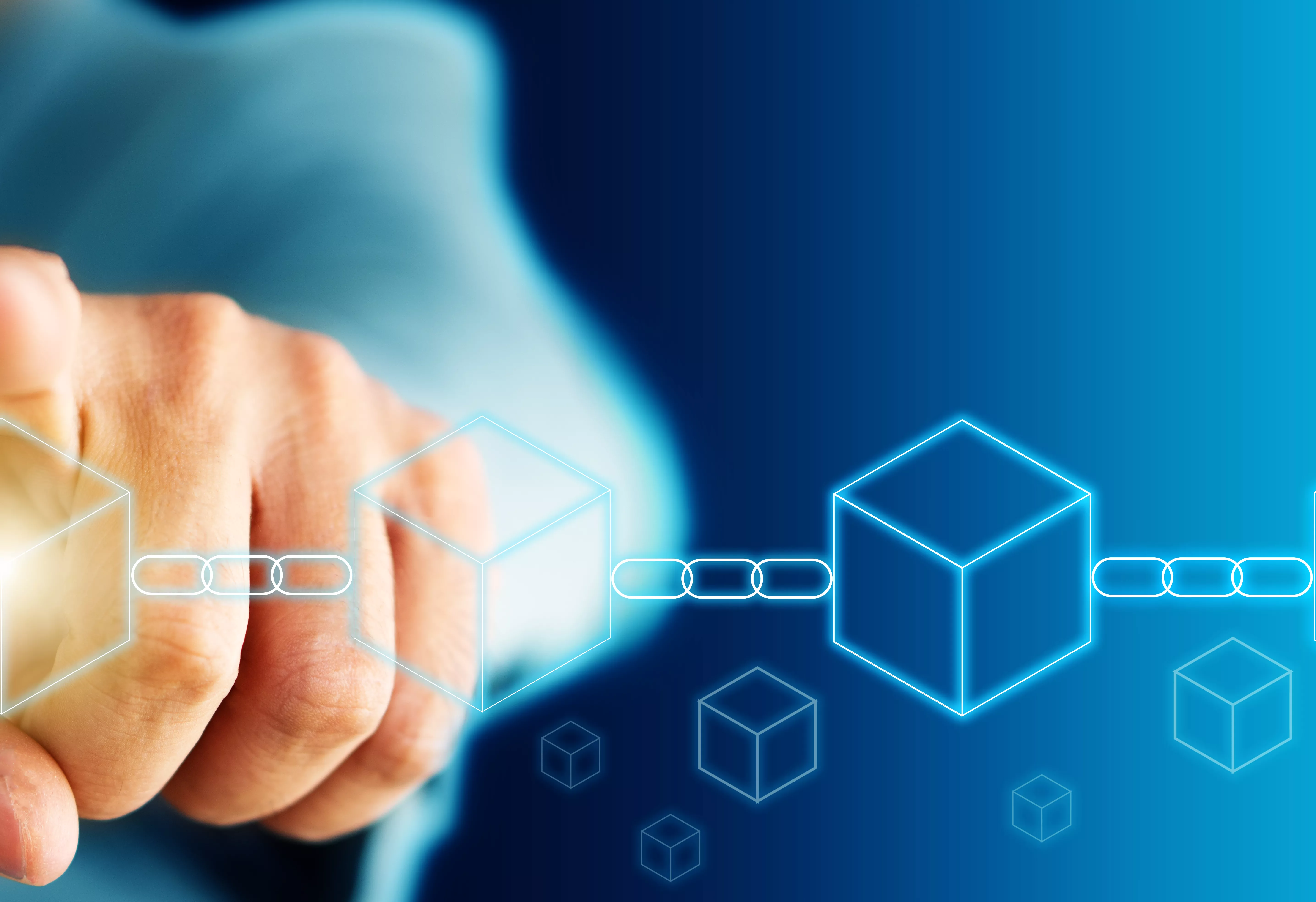 blockchain technology business concept to support finger touching first block in a chain of blocks