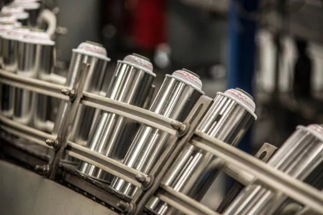 Image of aerosol cans on line