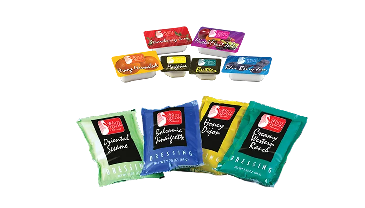 Plastic Condiment Containers and Sachet / Lidding Film Various sized plastic condiment containers next to multicolor condiment packets