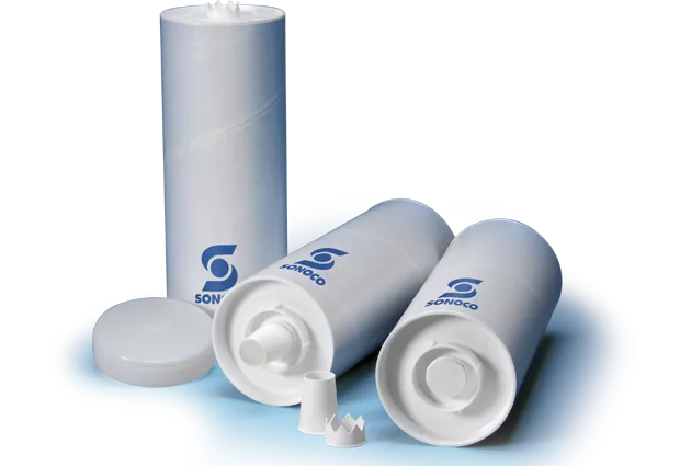 Three white paper cans of adhesives with flow tips for caulking or other applications