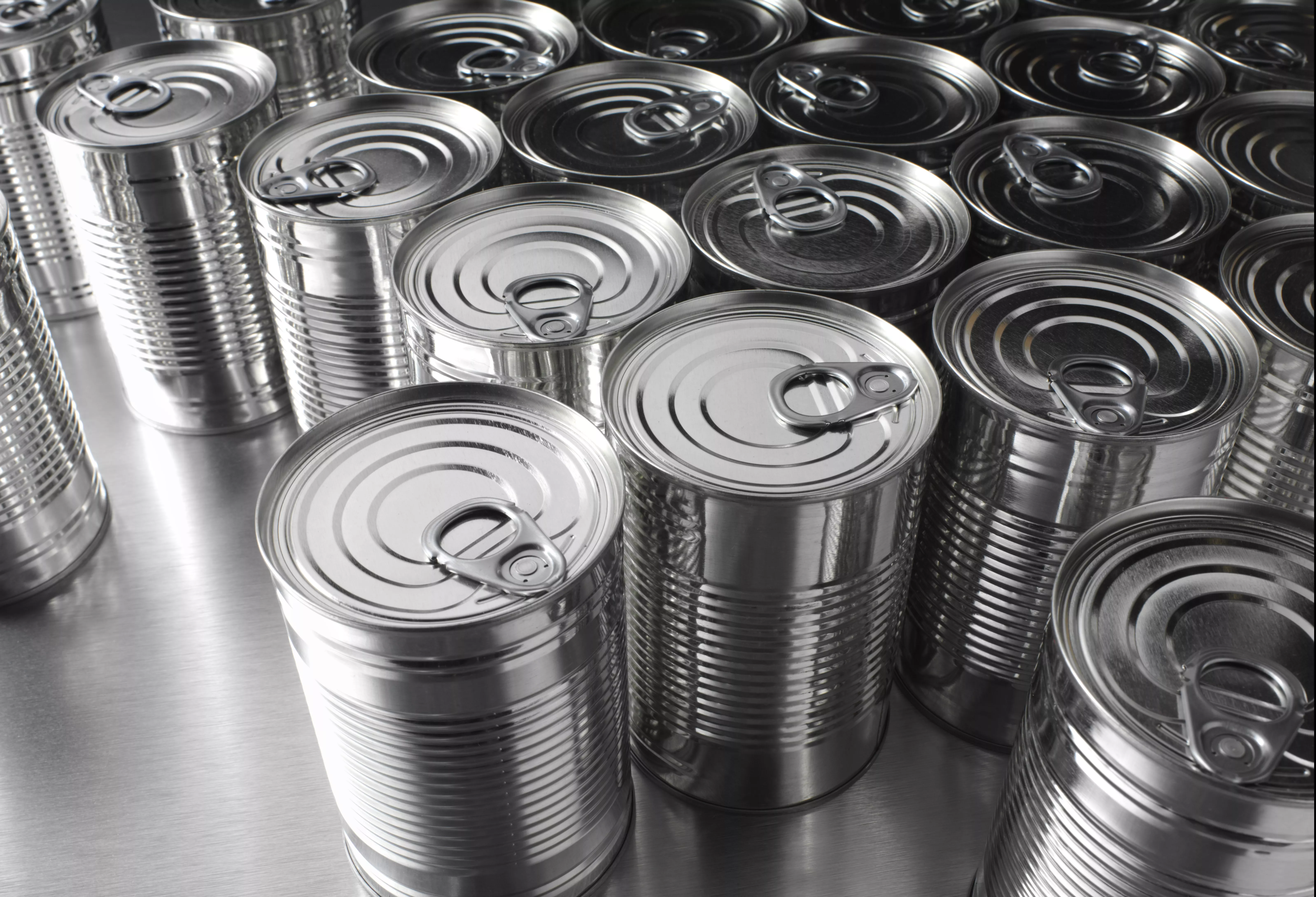 Image of group of round metal cans