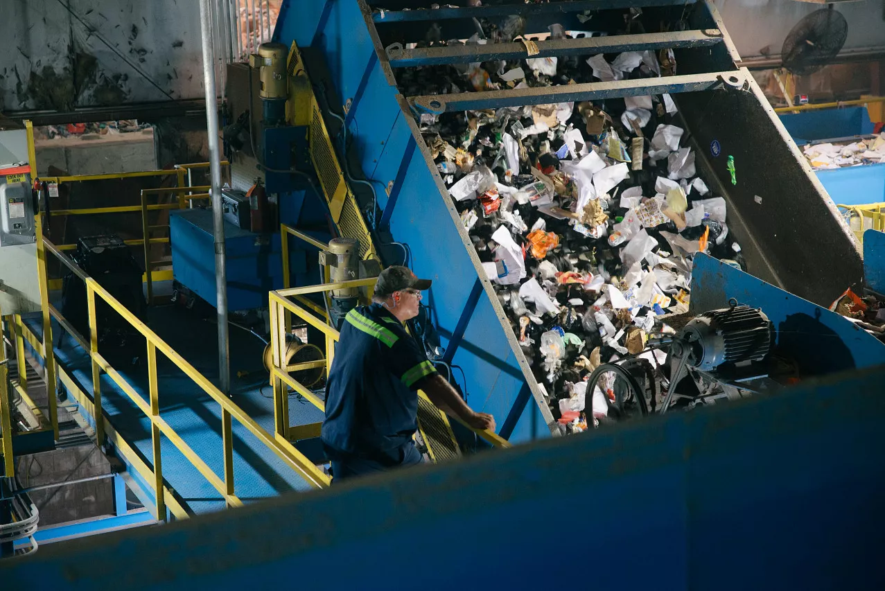 Worker in a recycling plant.