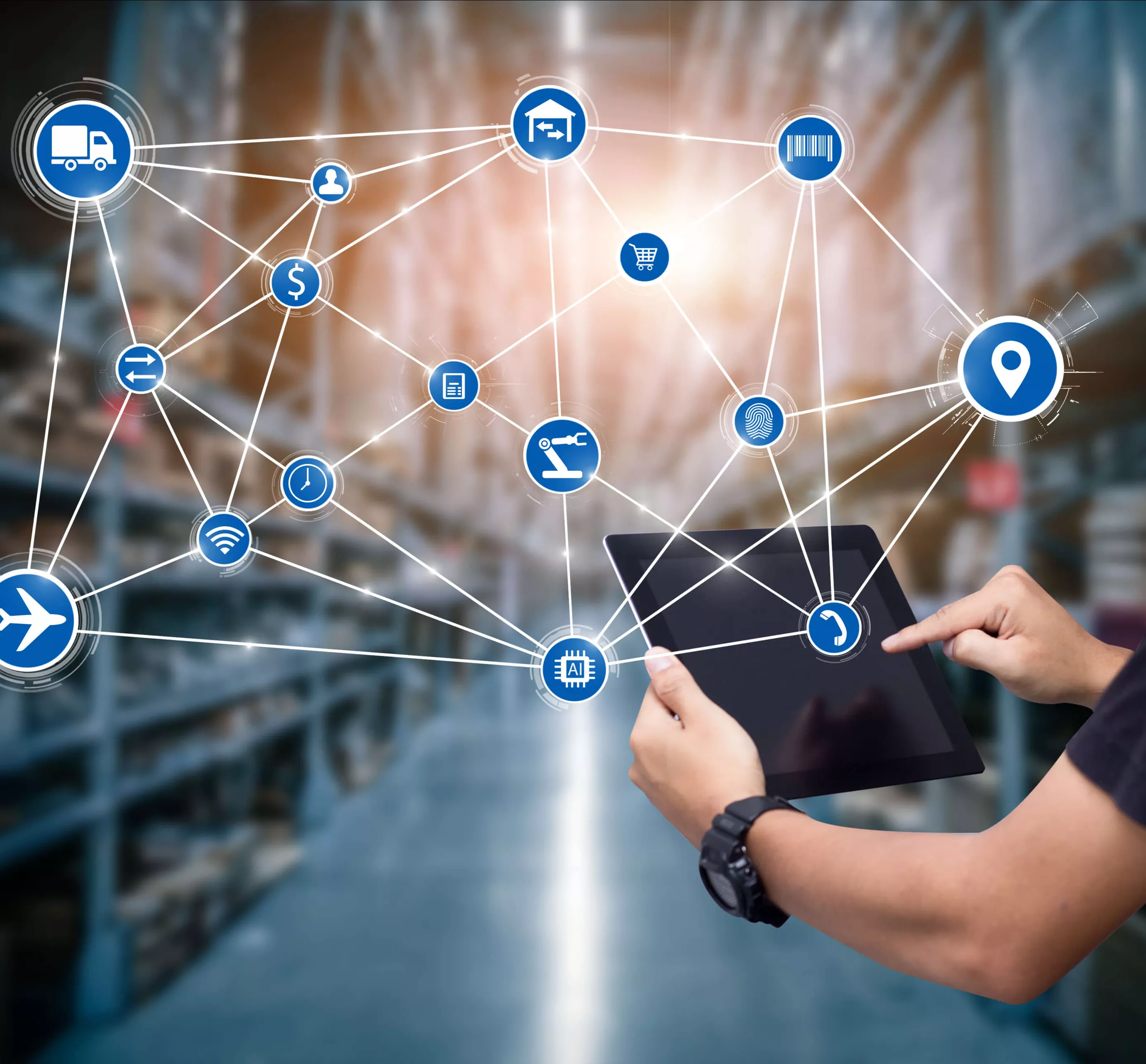 Man hands using tablet on blurred warehouse as background