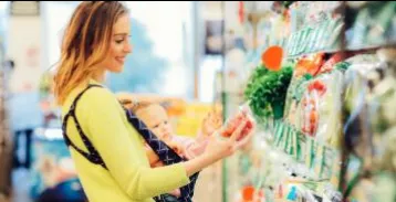 Woman shopping in a grocery store.