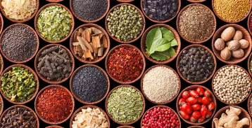 Dozens of different spices in small bowls