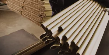 Long paper-based packing elements