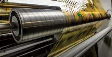 Film stretched over a rolling machine
