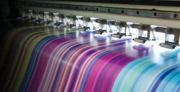 Printed materials come out of a machine