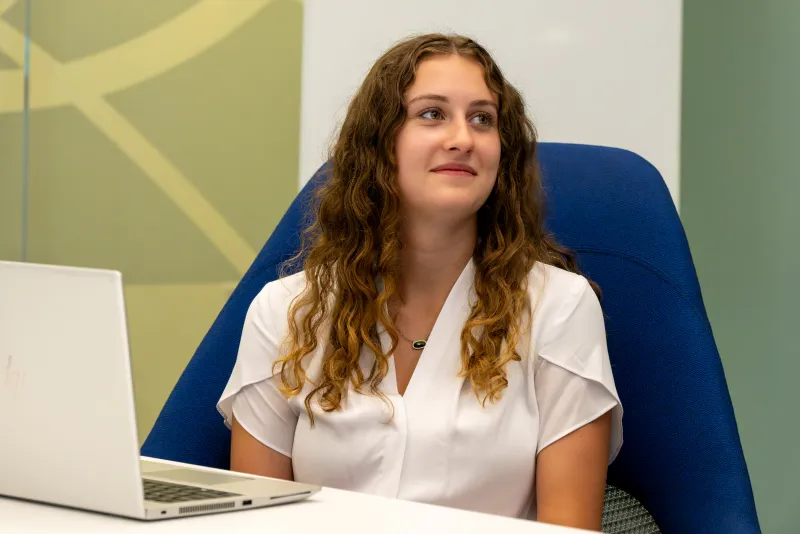 Intern sitting at a desk