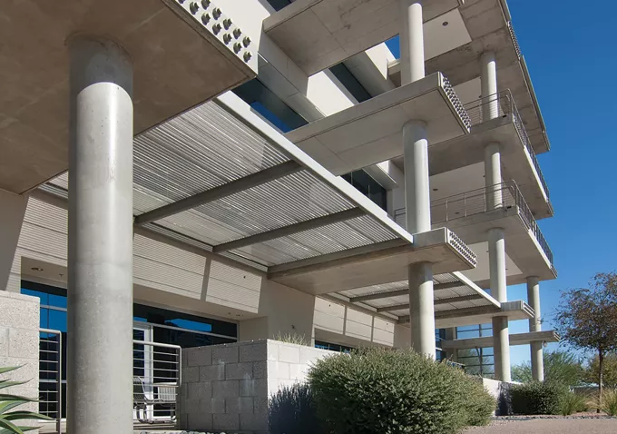 Building with four stories of smooth columns created using Finish Free concrete forms
