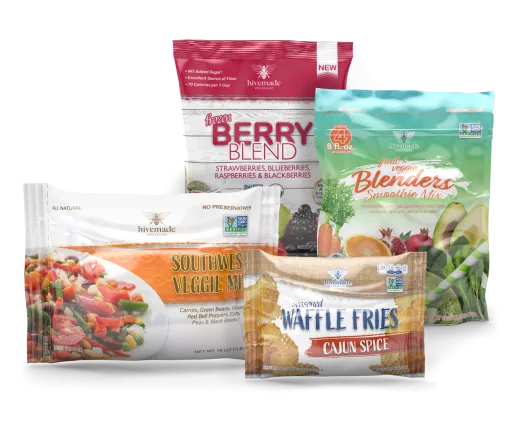 Frozen foods bags and pouches of varying types including a frozen veggie pillow bag and a stand up pouch of frozen berries.