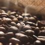 Closeup on steaming coffee beans